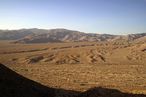 Photo of Mescal Bajada from Yaqui Ridge showing flow of drainages from the Pinyon Mountains