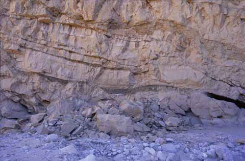 Photo of roadside rubble after a canyon wall fell by North Fork of Fish Creek Wash