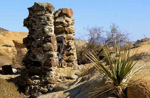 Photo of the ruins of a railroad construction camp for the San Diego & Arizona Railroad near Indian Hill